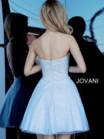 Back view of model wearing Jovani K2830 light blue dress featuring embellishments.