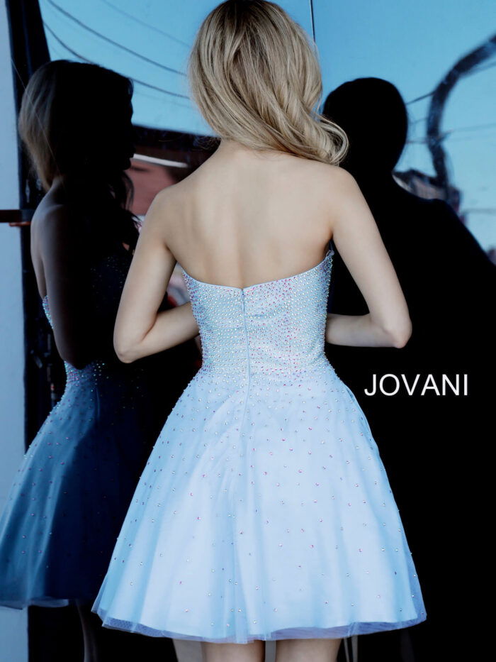 Back view of model wearing Jovani K2830 light blue dress featuring embellishments.