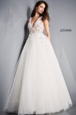 Model wearing Jovani 3110 ivory gown showcasing the full flowing skirt, front view.