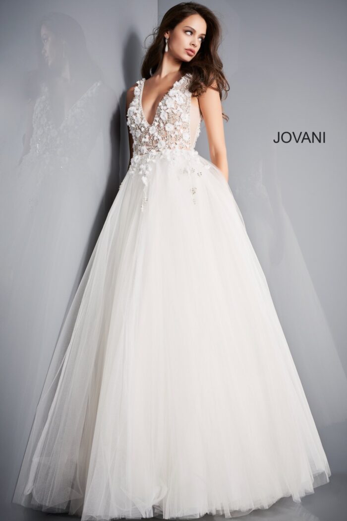 Model wearing Jovani 3110 ivory gown showcasing the full flowing skirt, front view.