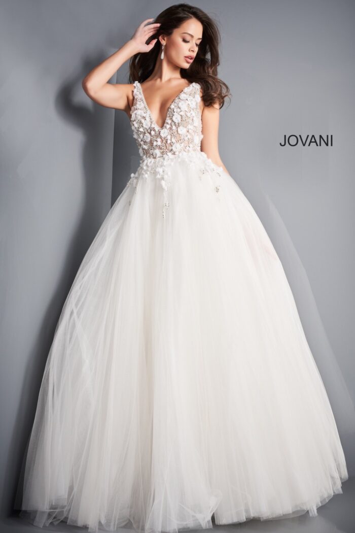 Model wearing Jovani 3110 ivory gown with floral applique and deep V-neckline, front view.
