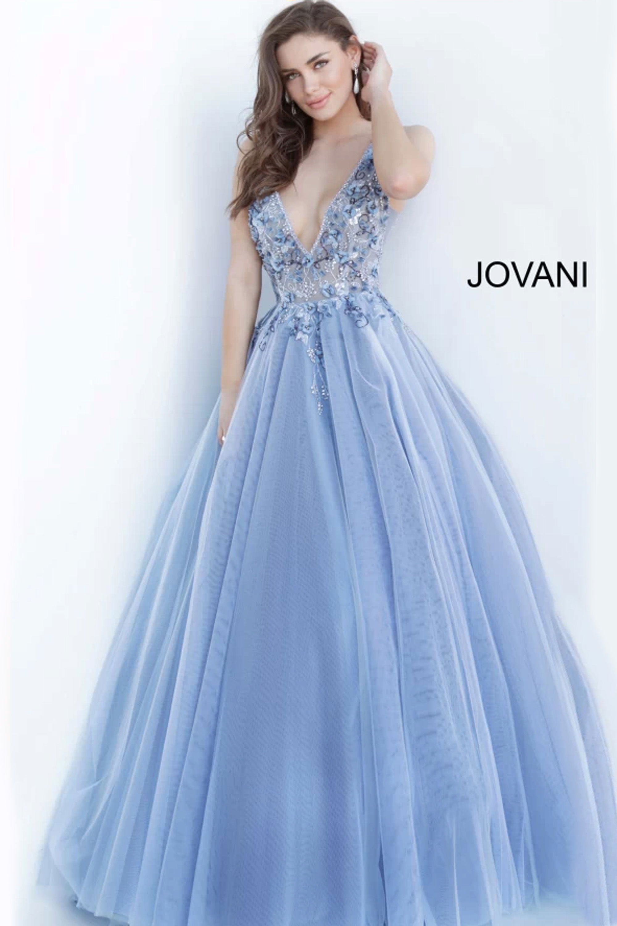 3110-ballgown-sexy.jpg Model wearing Jovani 3110 blue ballgown with deep V-neckline and embroidery, front view.