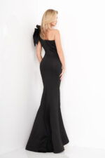 Jovani 32602 black gown's back view, highlighting the bow and fit