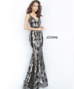 Model in Jovani 3263 black gunmetal gown displaying sequined design