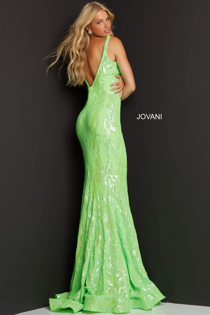 Back view of Jovani 3263 green mermaid gown with elegant V-back