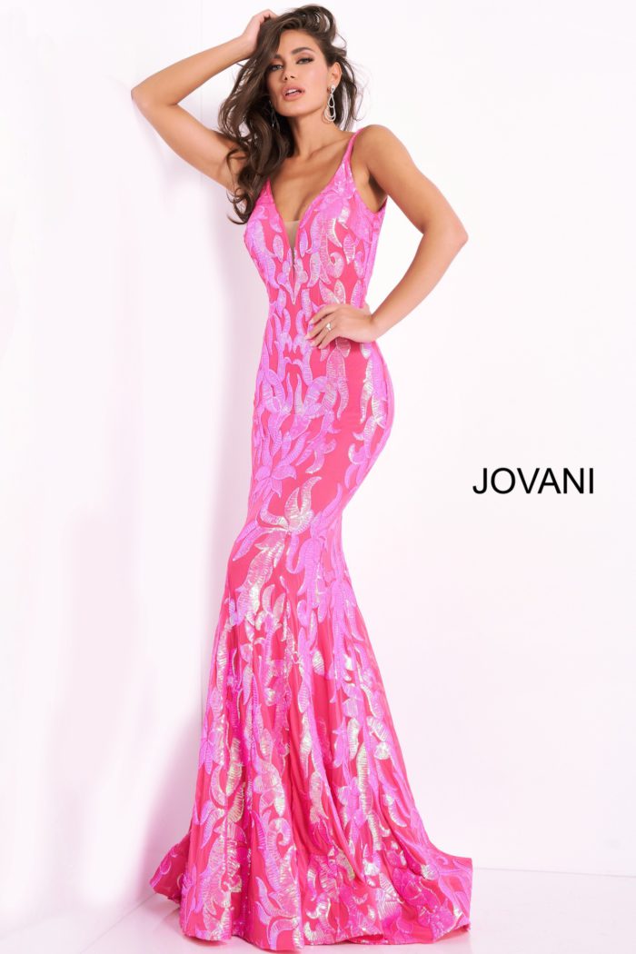 Model posing in Jovani 3263 hot pink gown highlighting sequined details