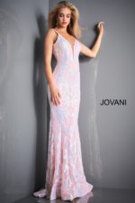 Model posing in Jovani 3263 light pink gown showcasing the sequined floral design