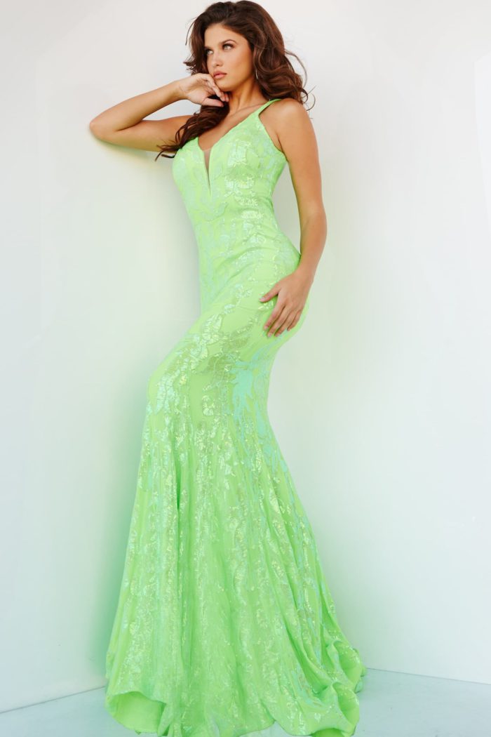 Model posing in Jovani 3263 neon green gown with floral sequins