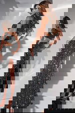 back view of model wearing Jovani 34011 black gown with cutout details