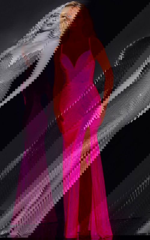 Model wearing Jovani 36403 pink dress with V-neckline and high slit from the front.