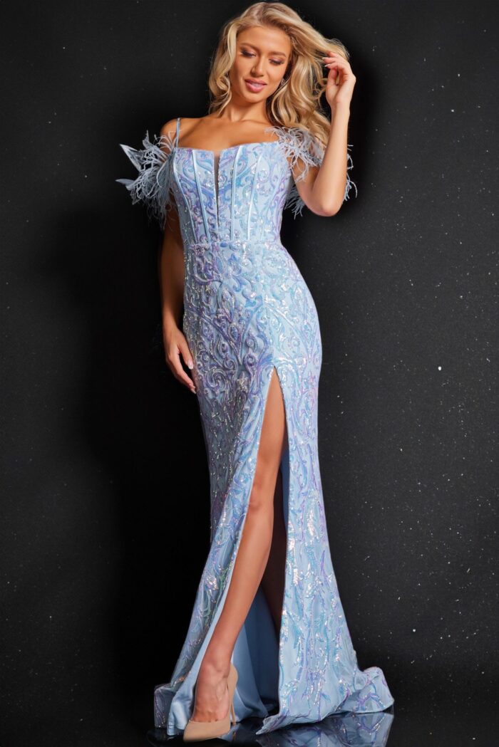 Model wearing Jovani 36419 elegant blue dress with feather embellishments and high slit, front view.