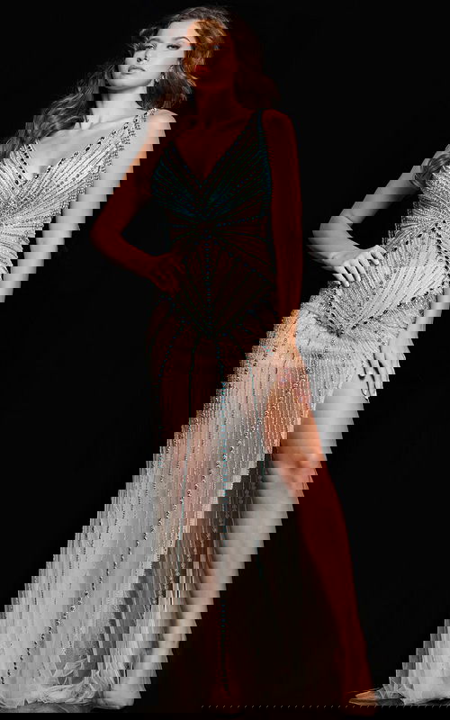 Model wearing Jovani 36422 nude dress with V-neckline and beadwork, front view.