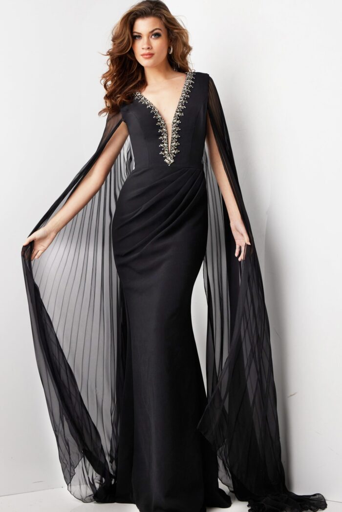 model wearing Jovani 36473 elegant black gown with deep V-neckline and draped sleeves