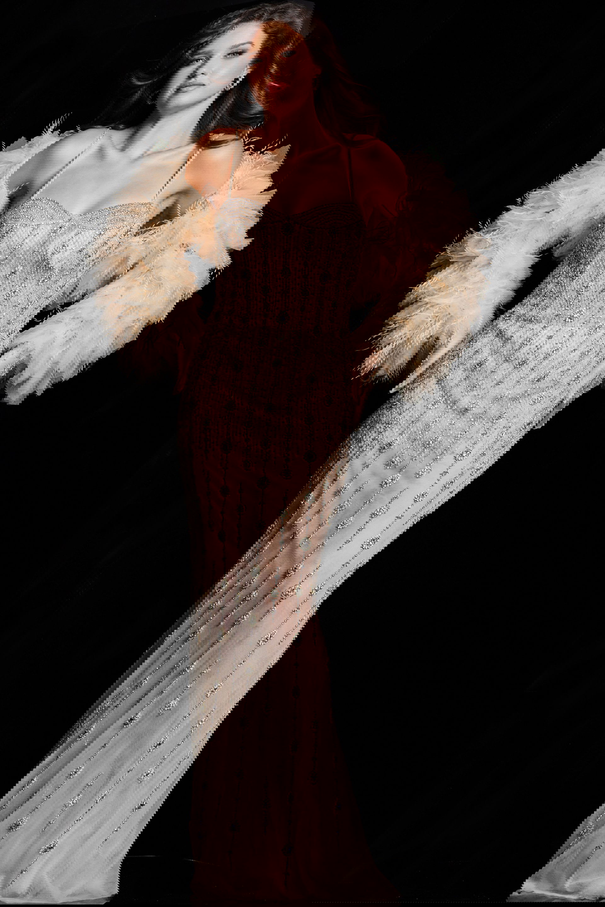 36510_NUDESILVER_31.jpg Model wearing Jovani 36510 nude gown with sweetheart neckline and feathered shrug, front view.