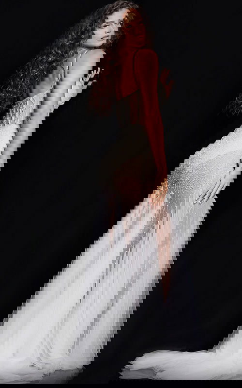 Back view of Jovani 36511 gown showing thin straps and layered white tulle skirt.