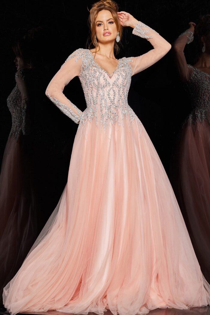 36533 blush gown with voluminous layers and sparkling embellishments.
