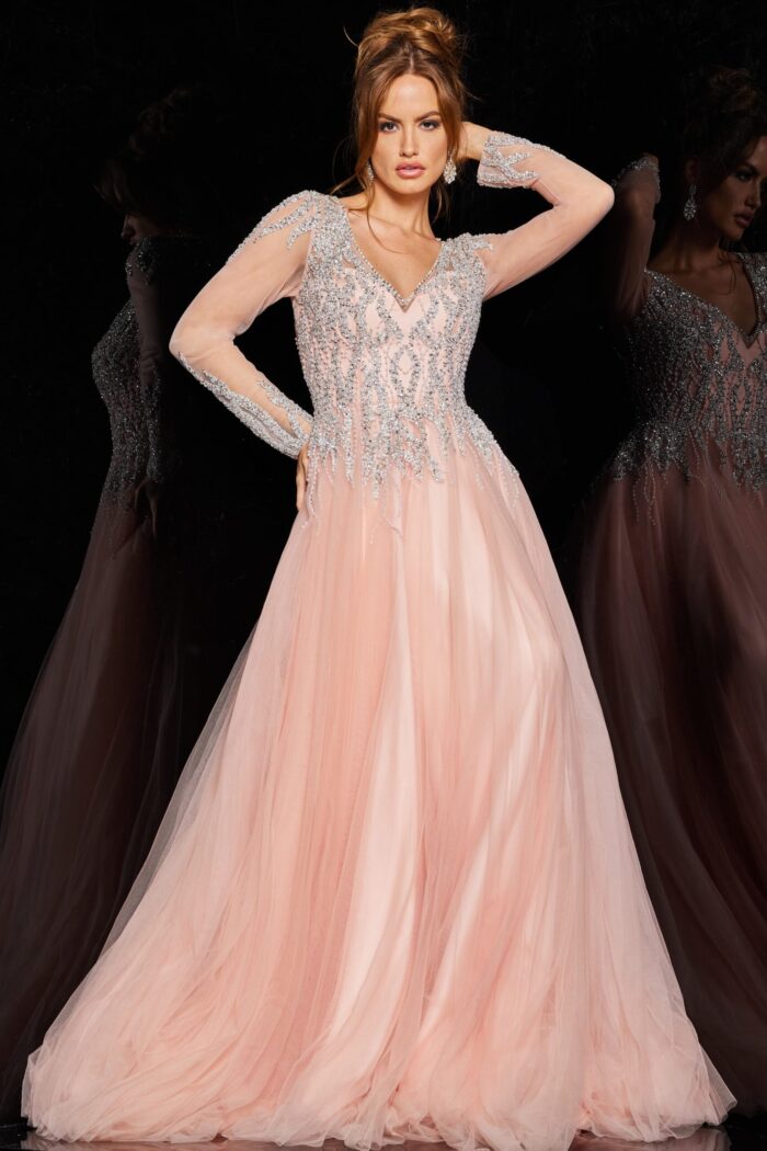 Front view of model in 36533 blush gown featuring a flowing A-line skirt.