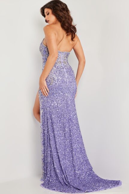 Model wearing 36537, lilac gown, back view highlighting train and sequined fabric.