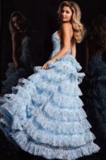 Back view of Jovani 36571 light blue gown showcasing ruffle detailing.