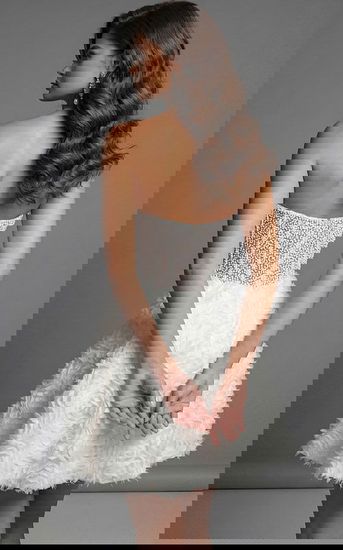 Strapless beaded corset dress with textured floral skirt and fitted bodice