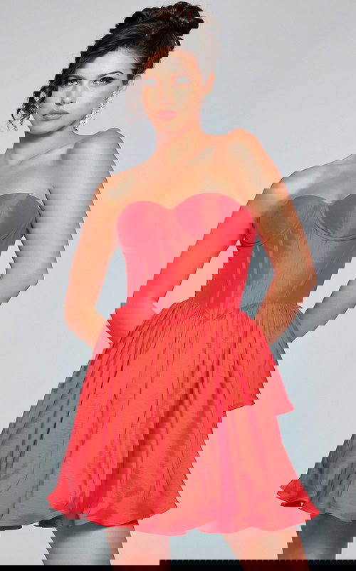 Model wearing Jovani 36620 black dress with sweetheart neckline.