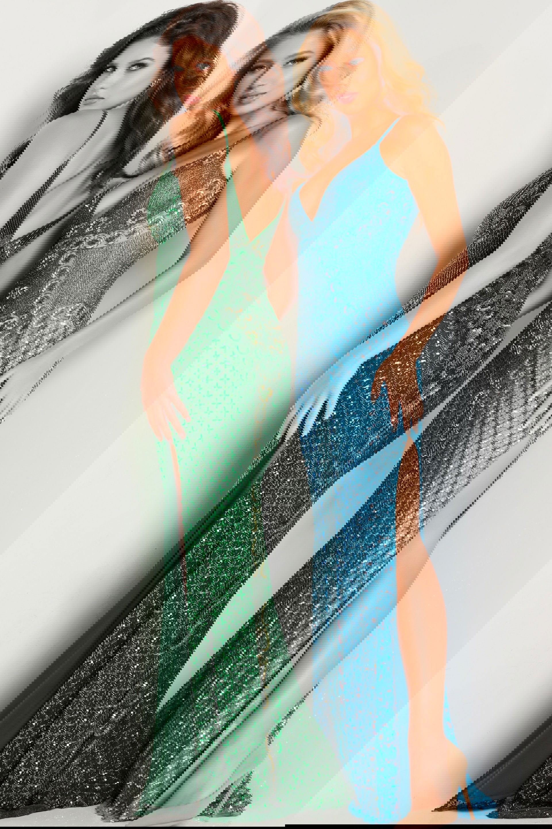 36643_blue.jpg Models wearing Jovani 36643 gown in blue and green with sequin embellishments and intricate patterns.