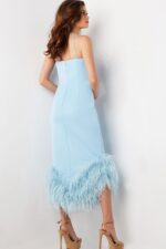 Rear view of model in Jovani 36675 light blue dress highlighting fitted silhouette and feathered hem.