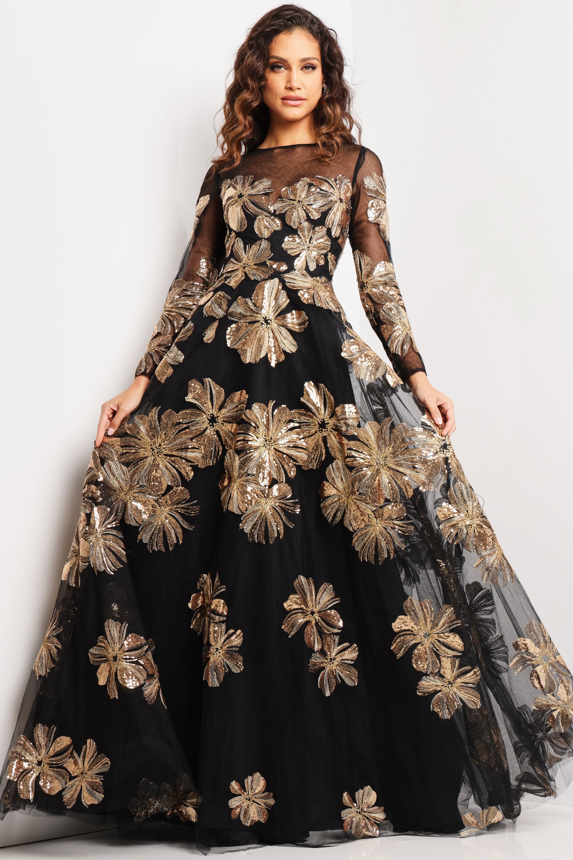 36716_BLACKGOLD_32.jpg Model wearing Jovani 36716 black gown with gold floral embroidery, front view.