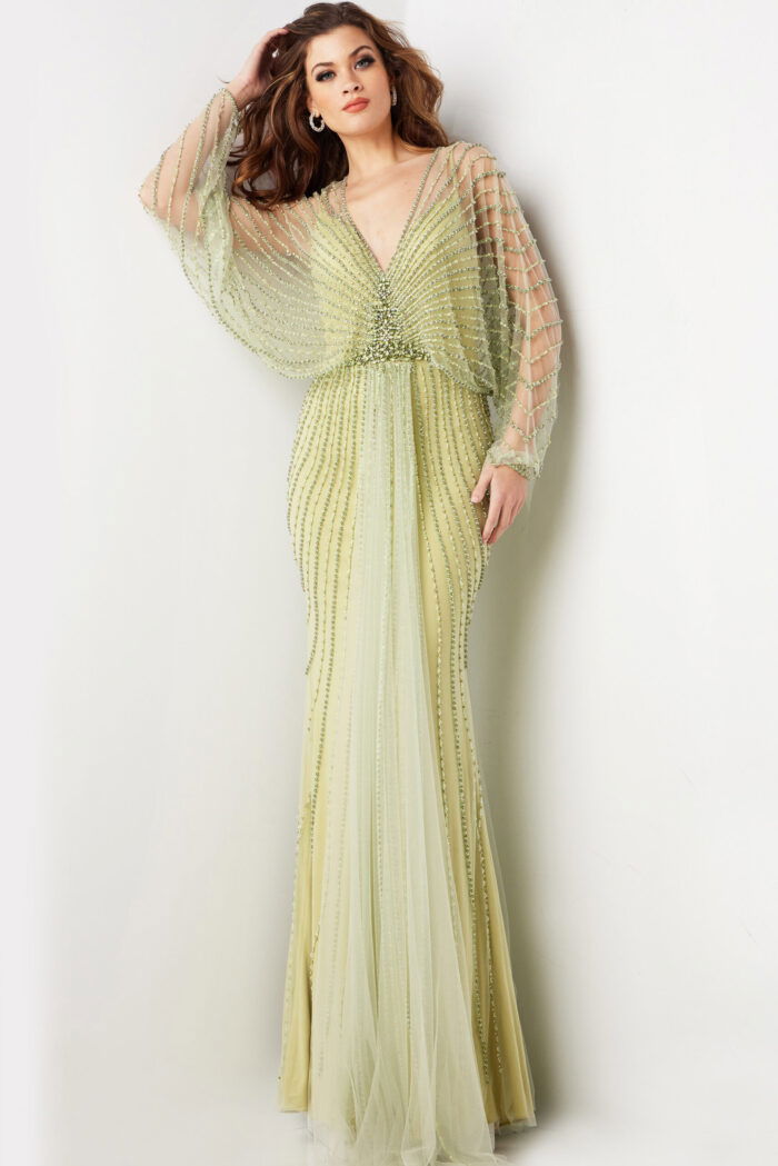 Model wearing 36744 green dress with V-neckline and beaded details
