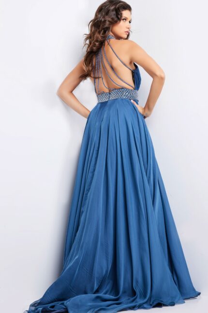 Back view of Jovani 36749 navy gown showing crisscross detailing and flowing skirt.