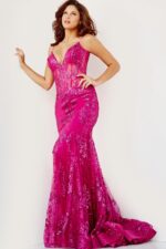 Model wearing Jovani 3675 dress in vibrant pink with sequin embellishments.