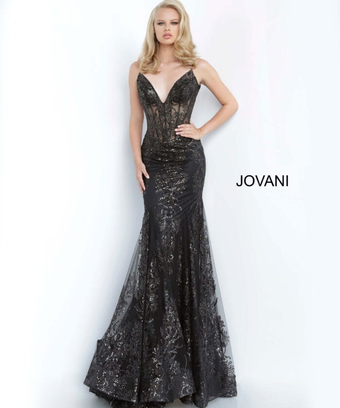 Model wearing Jovani 3675 black mermaid gown with lace detailing, front view
