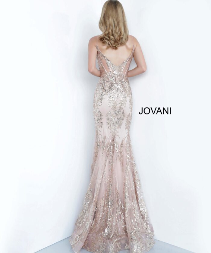 Model wearing Jovani 3675 rose gold mermaid gown with lace detailing, back view