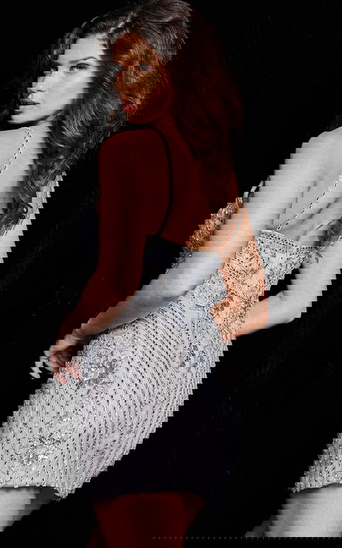 Model wearing Jovani 36786 Silver beaded dress V-neckline, spaghetti straps