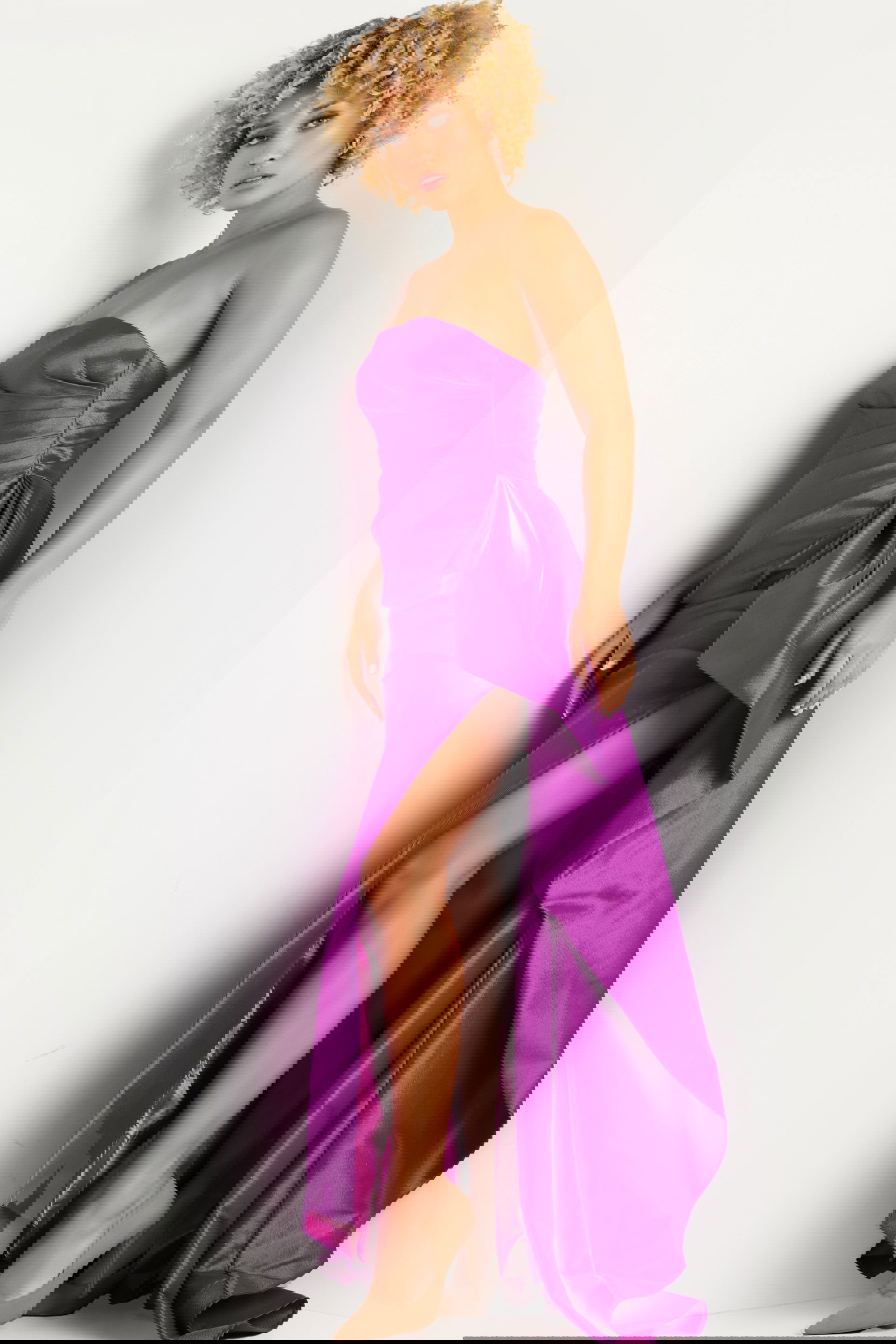 36854_purple.jpg Model wearing Jovani 36854 purple floor-length dress with strapless neckline and high slit