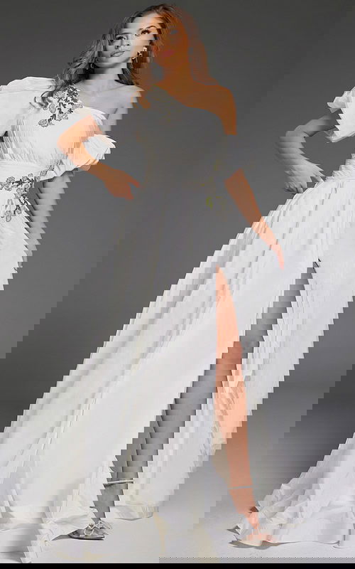 model wearing Jovani 36872 white gown back view with puffy sleeve detail