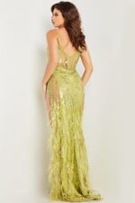 Model displaying the back of Jovani 36885 in green.
