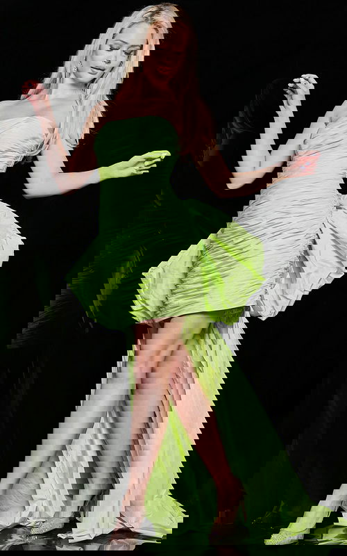 Model wearing Jovani 36928 lime green dress with strapless neckline and ruched bodice.