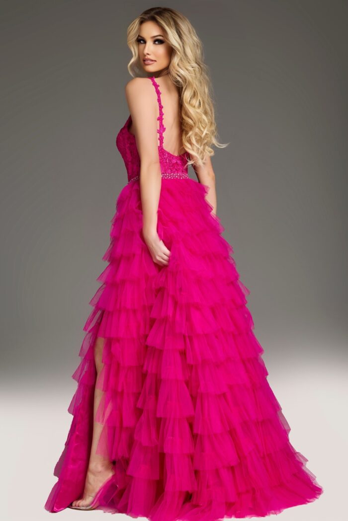 Back view of Jovani 37001 fuchsia gown, showcasing dramatic ruffles.