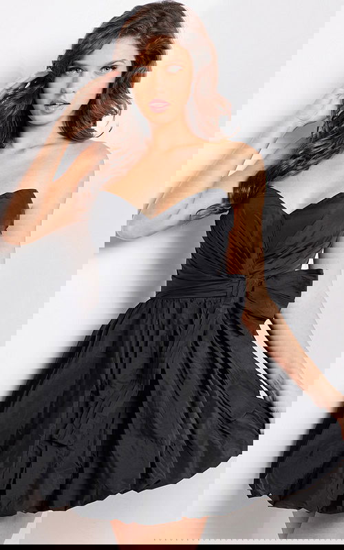 Model wearing Jovani 37016 black dress with sweetheart neckline and bow detail, front view.