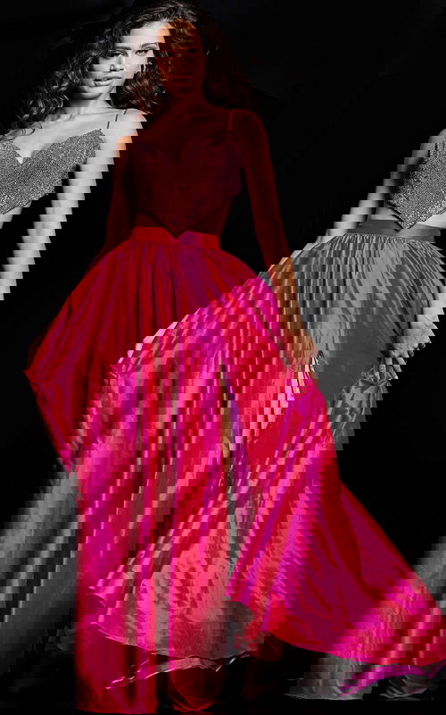 Model wearing fuchsia Jovani 37045 dress with embellishments and a high slit