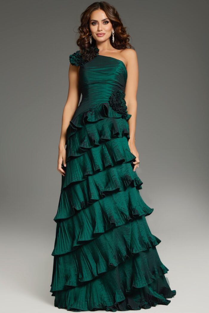 Model wearing Jovani 37065 elegant green tiered gown with one-shoulder neckline.