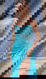 Front view of a strapless evening gown with a beaded bodice, draped waist, and high slit