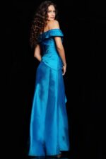 Model wearing Jovani 37098 gown, back view highlighting flowing fabric and seam detail.