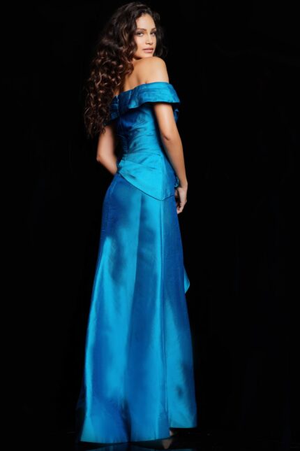 Model wearing Jovani 37098 gown, back view highlighting flowing fabric and seam detail.