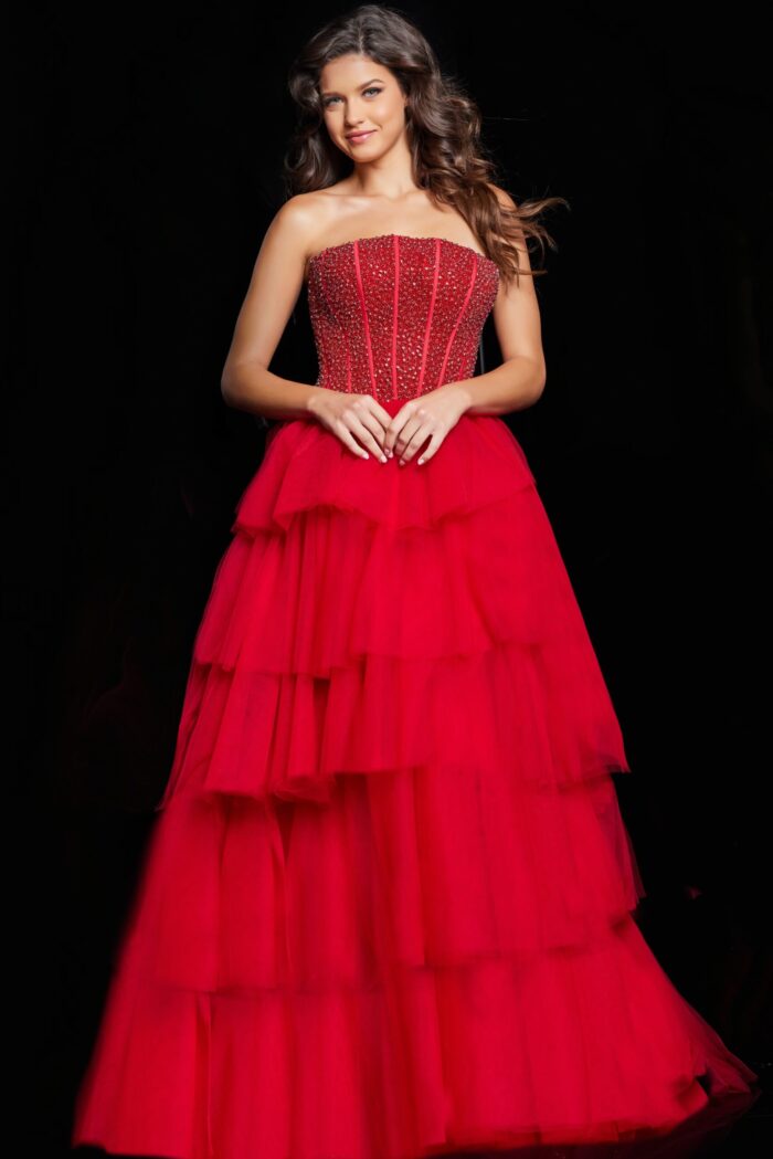 Model wearing Jovani 37210 red gown, front view showing beaded bodice.