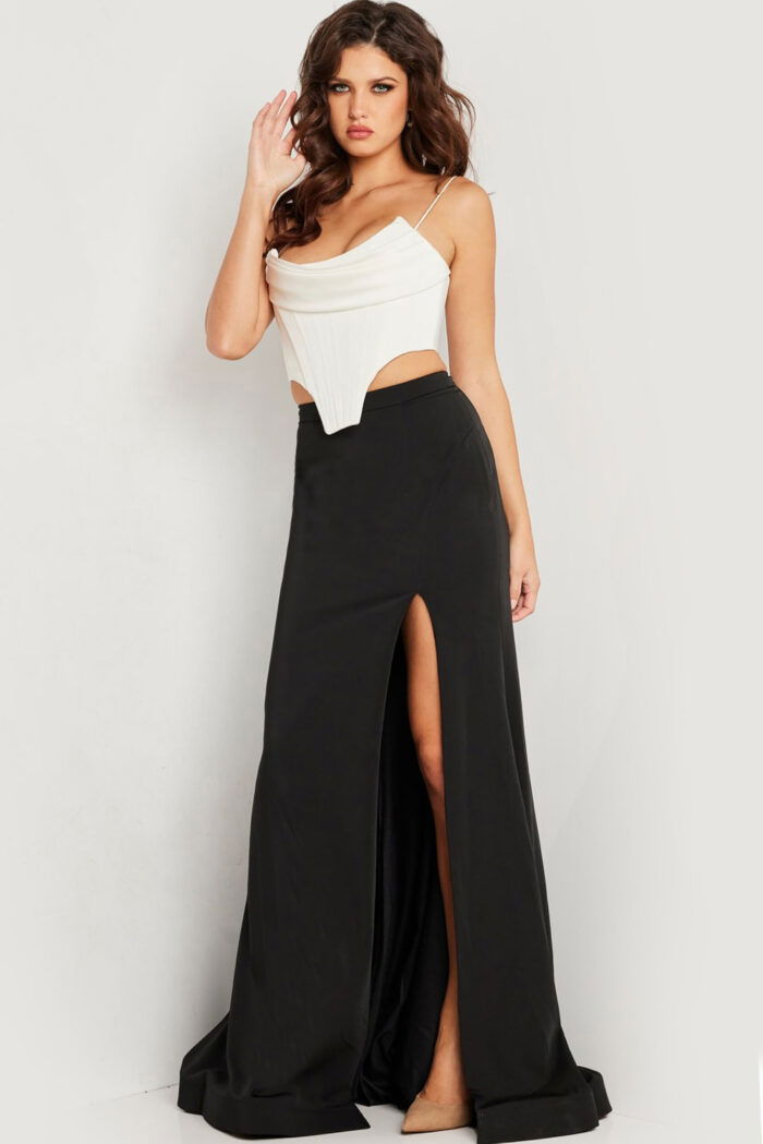 Model wearing Jovani 37234 white dress with fitted bodice and high slit, front view.