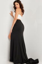 Model wearing Jovani 37234 white dress, showcasing back details and flowing skirt.
