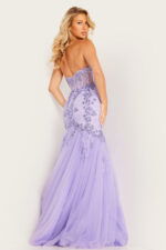 Model showing the back of Jovani 37249 lilac dress, highlighting elegant design.