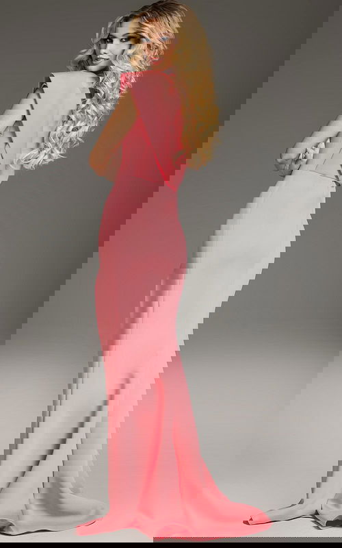 Model wearing Jovani 37285 pink one-shoulder dress, back view showing cascading shoulder detail.
